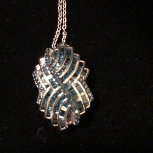 Blue diamond pendant with 18 inch chain.